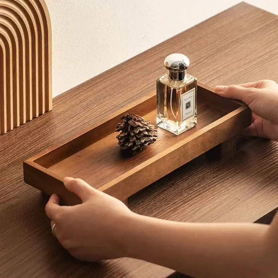Oak serving tray styled on a wooden table for everyday hosting.