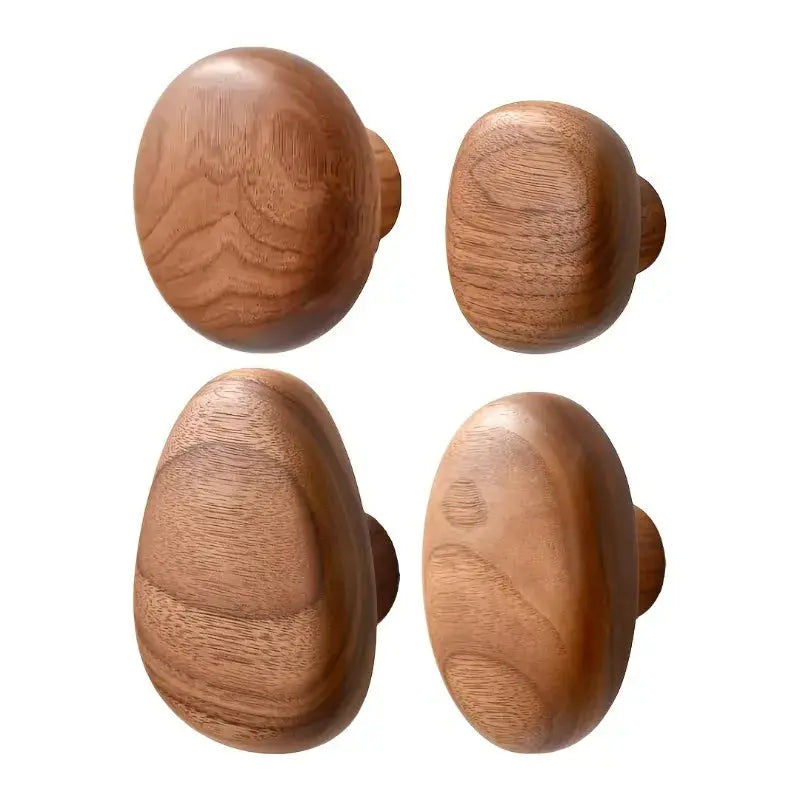 The Quartet Wooden Coat Rack Wall Hooks featuring four elegant wooden hooks for coat and accessory organization.