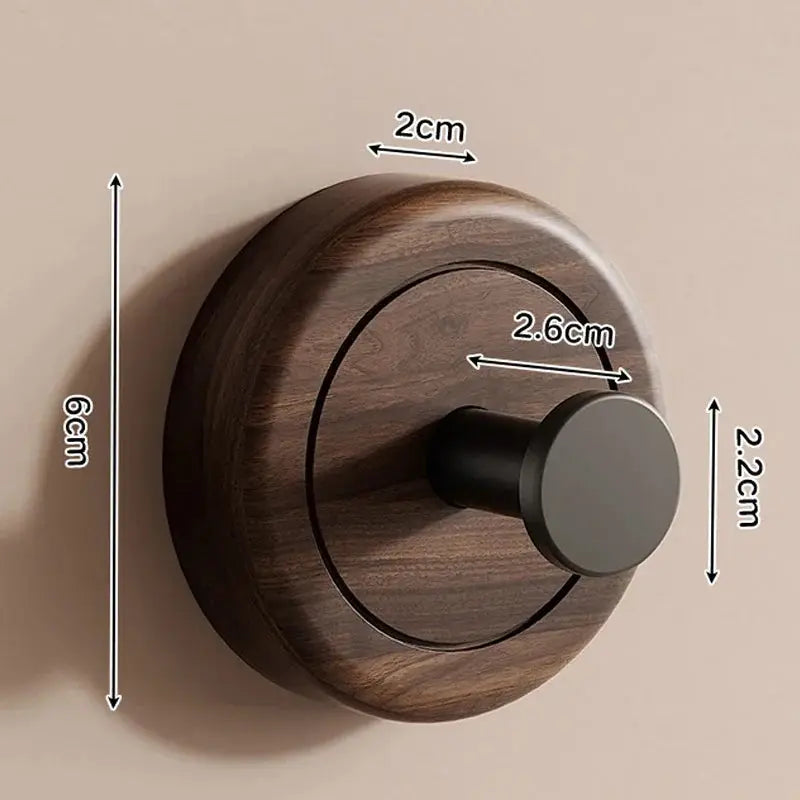 The Hang Walnut Wood Suction Cup Hook dimensions showing its minimalist design and walnut finish.